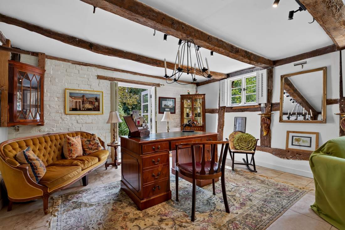A further reception room at Priors Court, Aylton, opening onto the garden