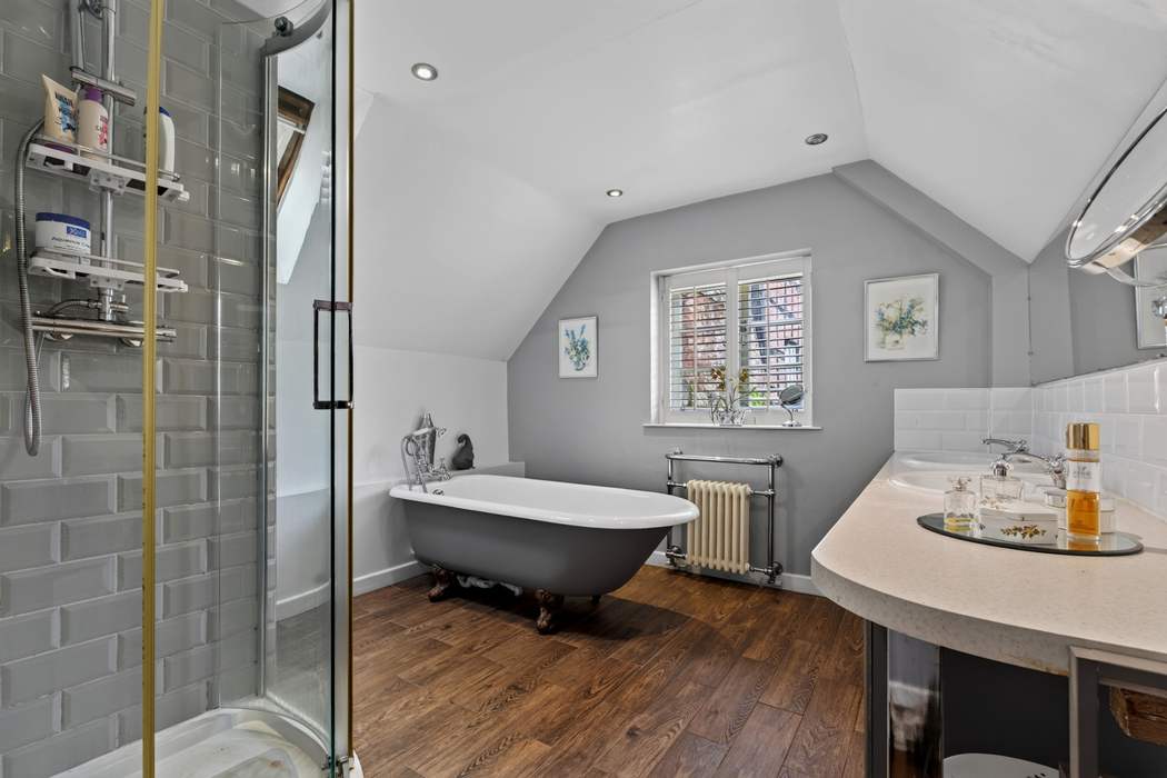 The principal bathroom at Priors Court, Aylton, with a freestanding roll-top bath