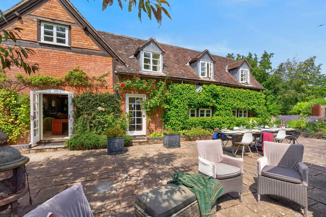 The terrace at Priors Court, Aylton, set up for outdoor entertaining