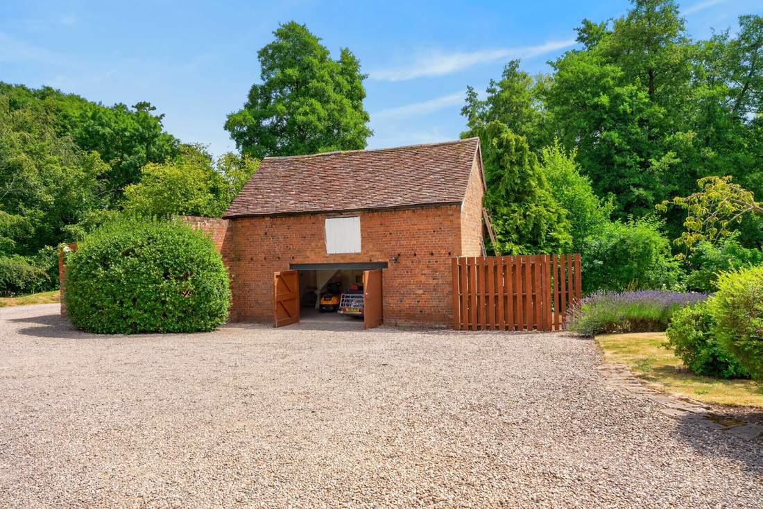 The detached garage building at Priors Court, Aylton, with potential for conversion subject to consent